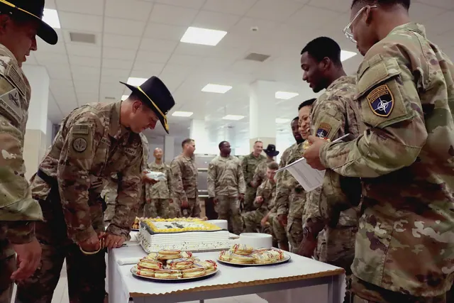 U.S. Army Command Sgt. Maj. James Hughbanks, the armor senior sergeant of 2nd Squadron, 12th Cavalry Regiment, 1st Armored Brigade Combat Team, 1st Cavalry Division, cuts a birthda. How to make sense of athletes with february birthdays