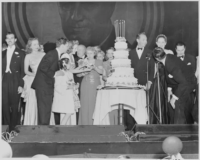 Photograph of First Lady Bess Truman distributing birthday cake to Hollywood celebrities at a Roosevelt Birthday Ball... - NARA - 199338. Celebrity birthday apps compared: which one is accurate enough for a calendar?