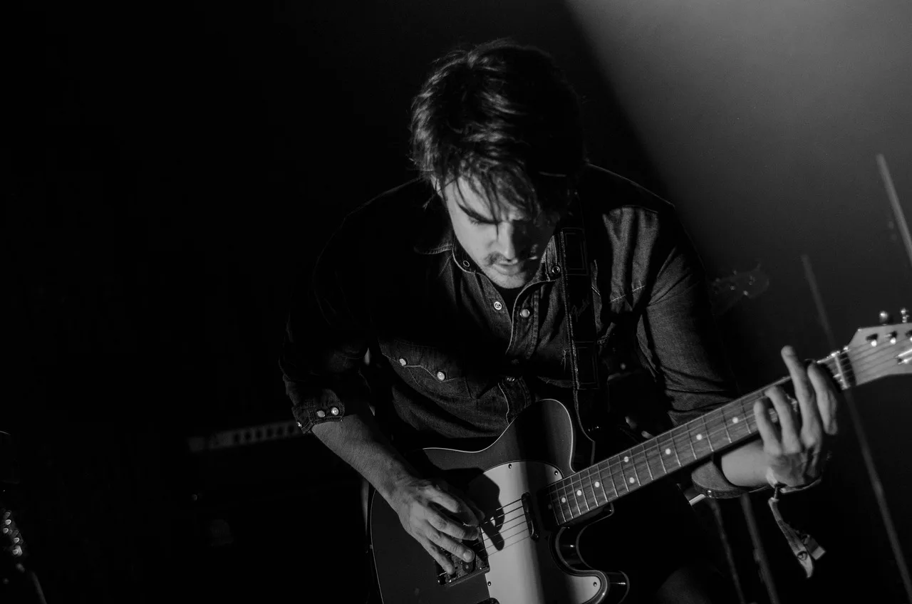 guitar, guitarist, man, music, musical instrument, musician, performance, person, string instrument, black and white, monochrome, guitar, guitar, guitar, guitar, guitar, guitarist, guitarist, music, music, musician, musician. How to make sense of musicians with late-year birthdays (2027 update)