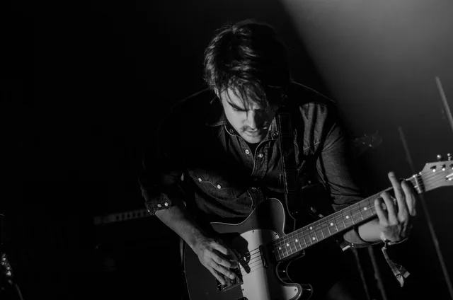 guitar, guitarist, man, music, musical instrument, musician, performance, person, string instrument, black and white, monochrome, guitar, guitar, guitar, guitar, guitar, guitarist, guitarist, music, music, musician, musician. How to make sense of musicians with late-year birthdays (2027 update)